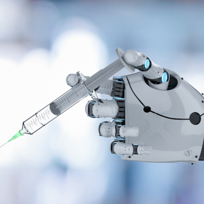 A white robotic hand and a gloved human hand 
